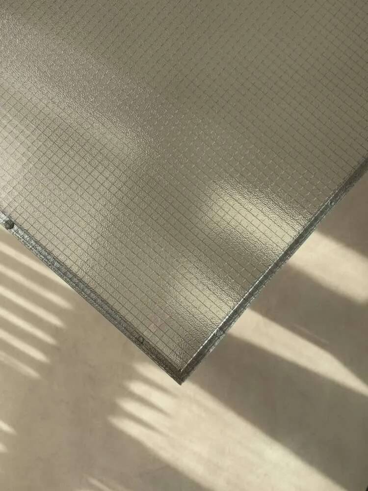 Minimalist 1960s wire glass coffee table in stainless steel.