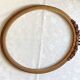 Oval frame with gilded pediments 19th wood and stucco