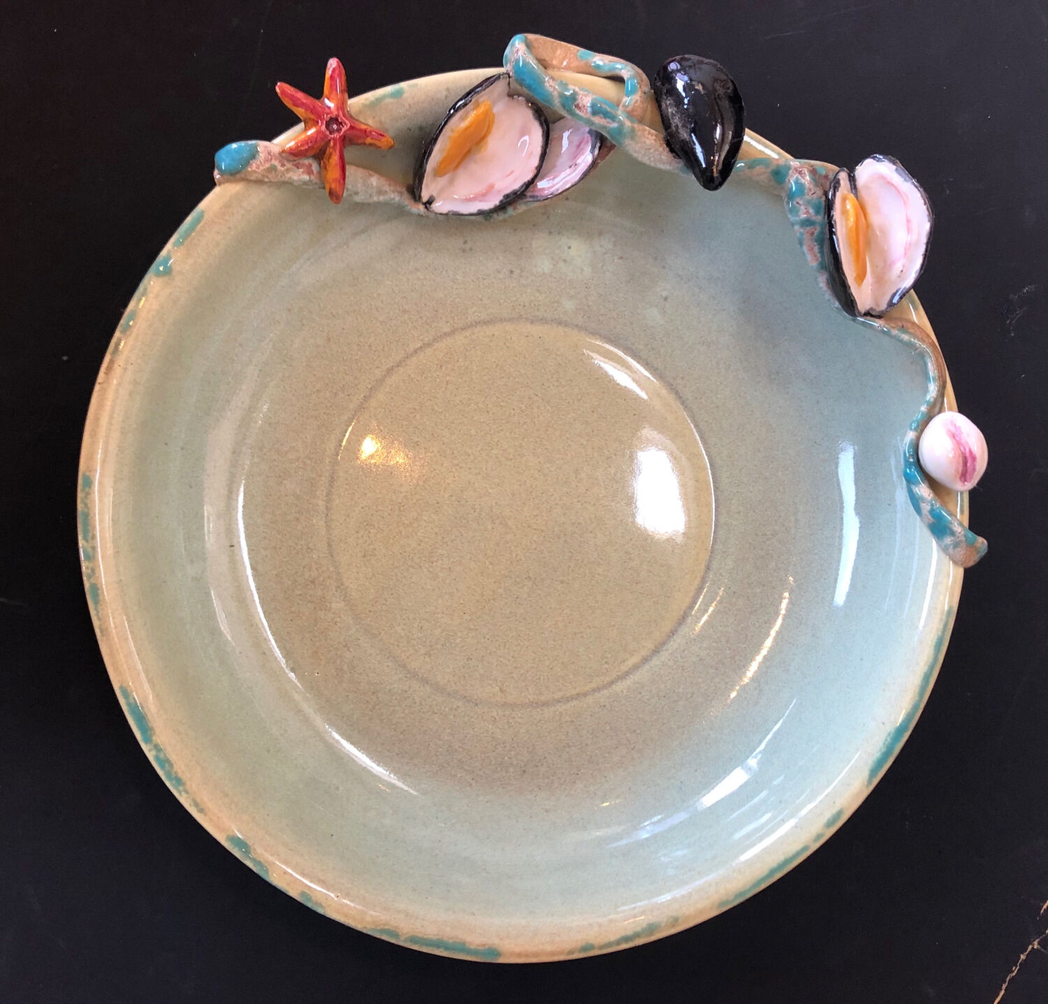 Paris ceramic dish with slip decoration, by Suzy Coste