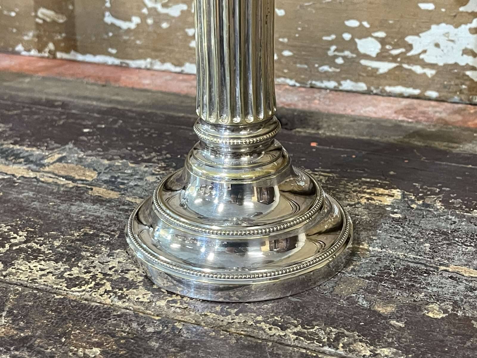 Pair of 2-branched candlesticks in silver metal