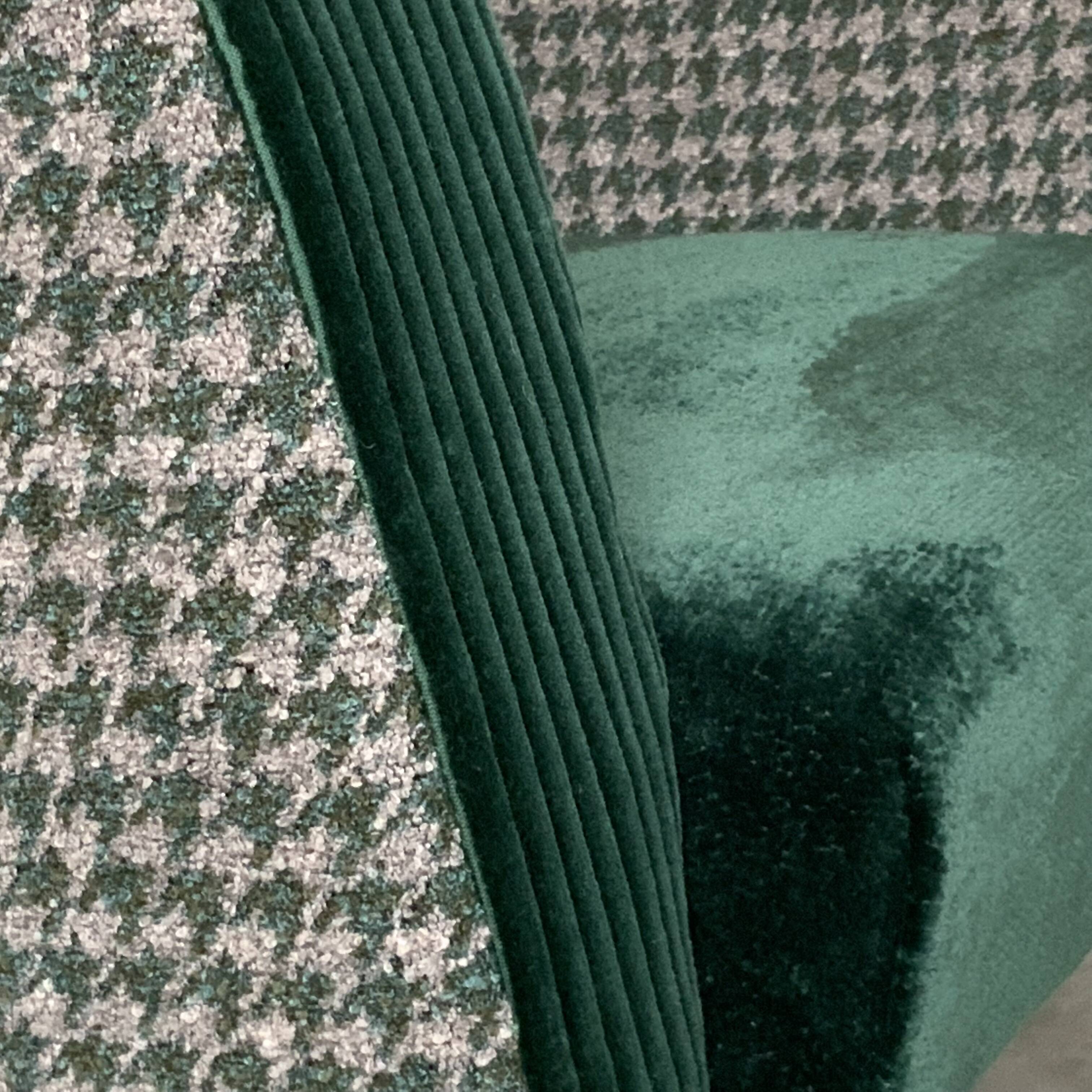 Retro armchair from around 1960 in forest green with houndstooth pattern.