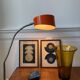 Orange workshop lamp with a clamp – 1970s