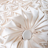 Old round cushion in white, beige pleated silk