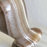 Natural stone vase with marbled patterns.