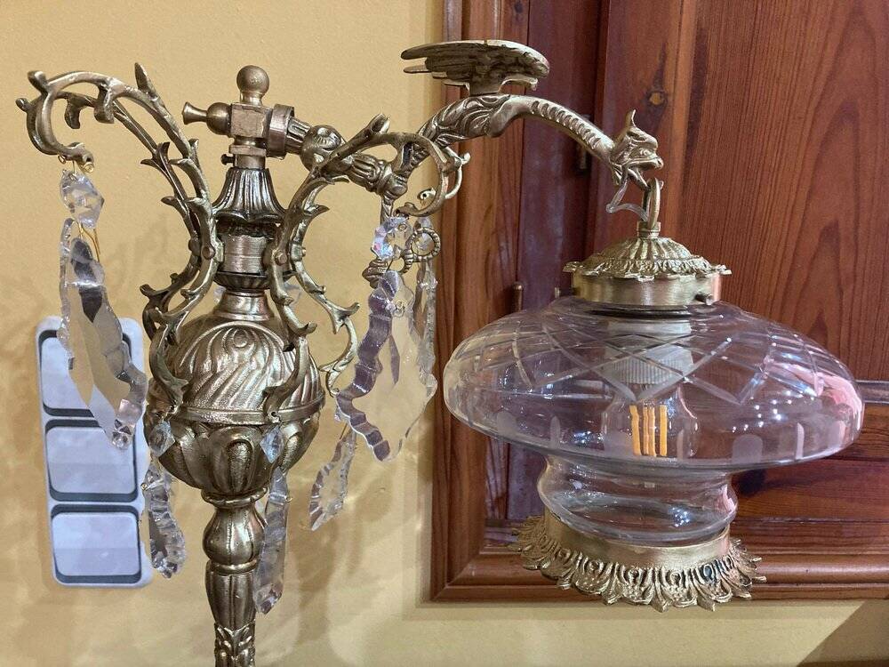 Bronze table lamp with dragon arm and cut glass shade, 1940s