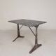 Bistro table with a marble top on a cast iron frame, 1930s.