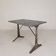 Bistro table with a marble top on a cast iron frame, 1930s.