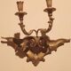 Pair of antique wall sconces in gilded wood from the 19th century.