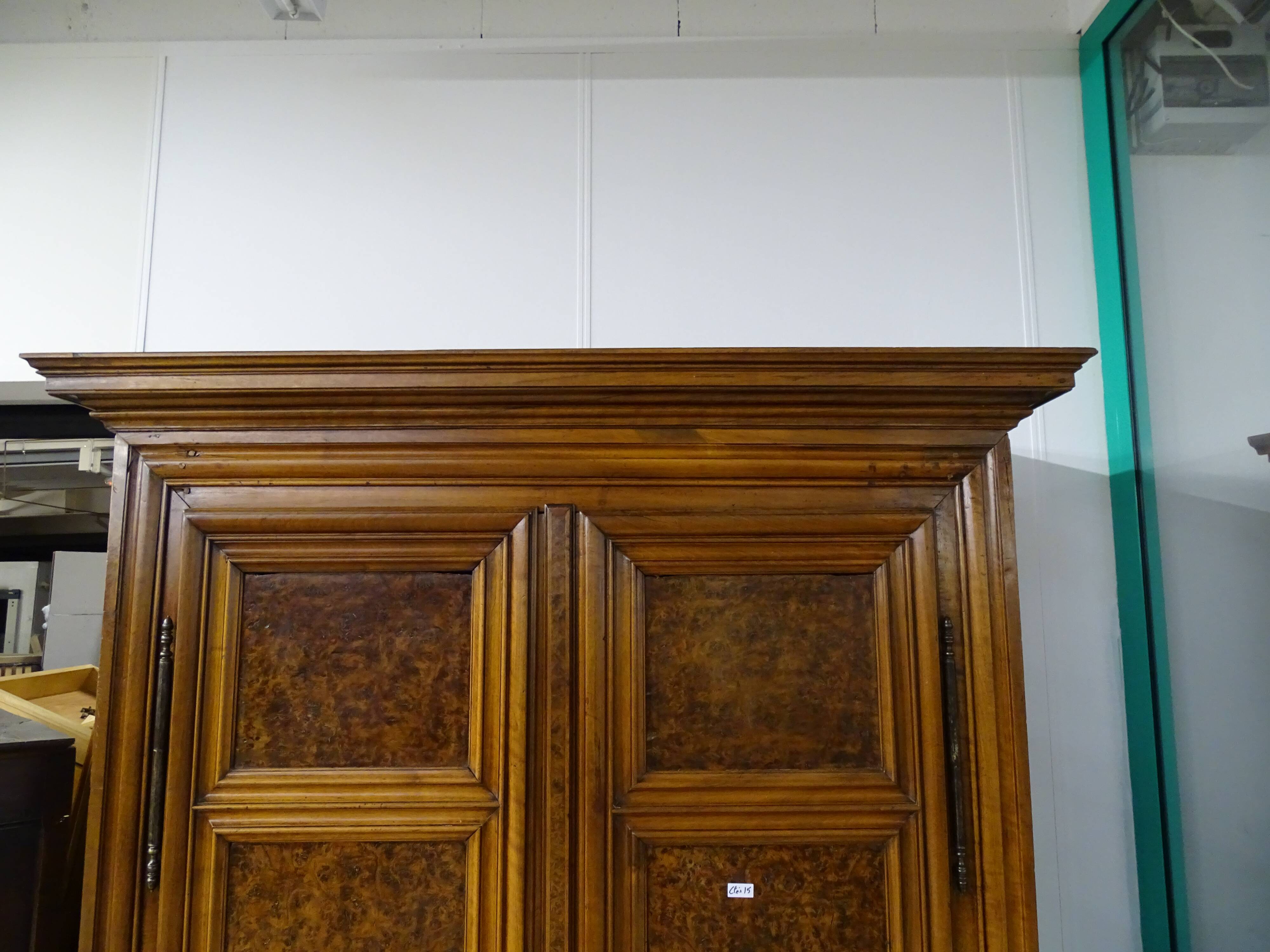 Walnut cabinet and ash magnifying glass
