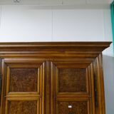 Walnut cabinet and ash magnifying glass