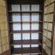 Antique library finished in white with a cerused effect.
