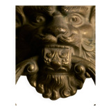 Lion door knocker, in brass