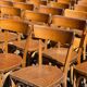 Lot of 60 wooden bistro chairs from the Baumann 1970s
