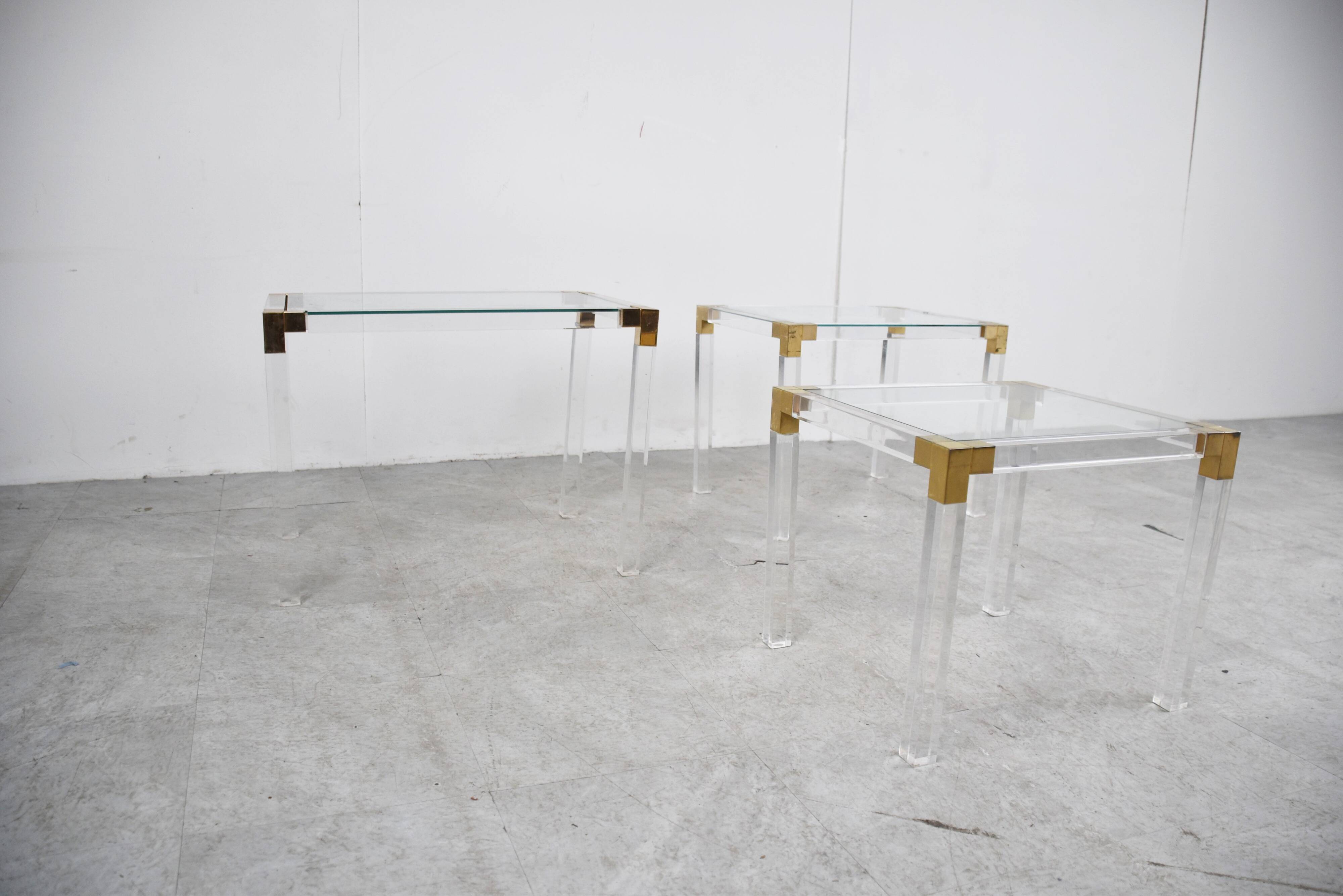 Vintage lucite and brass nesting tables, 1970s