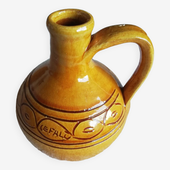 Glazed ocher round pitcher with handle