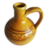 Glazed ocher round pitcher with handle