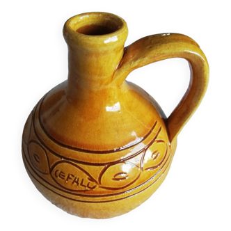 Glazed ocher round pitcher with handle