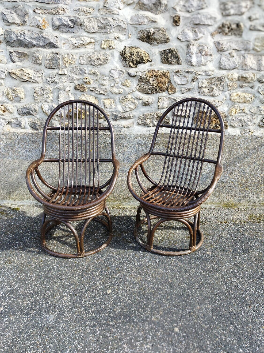 Pair of vintage rattan swivel chairs