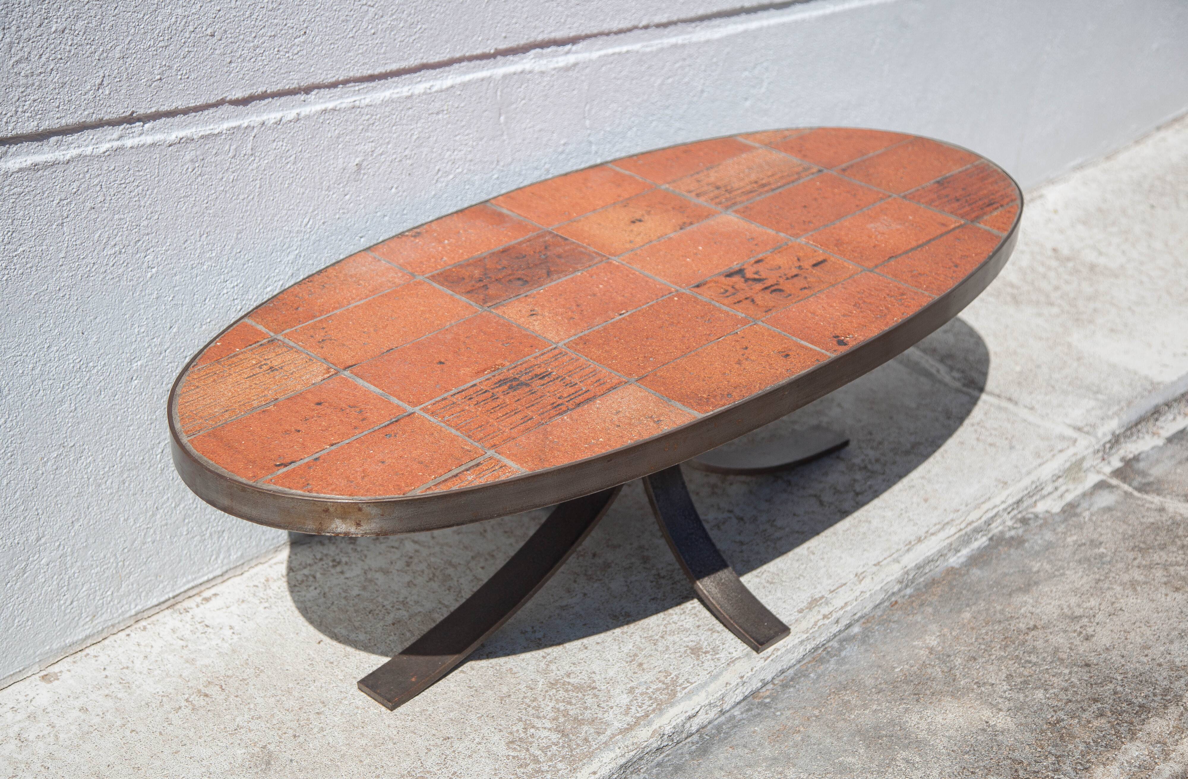 Jean Jaffeux coffee table, glazed lava stone table with wrought iron structure, 60's