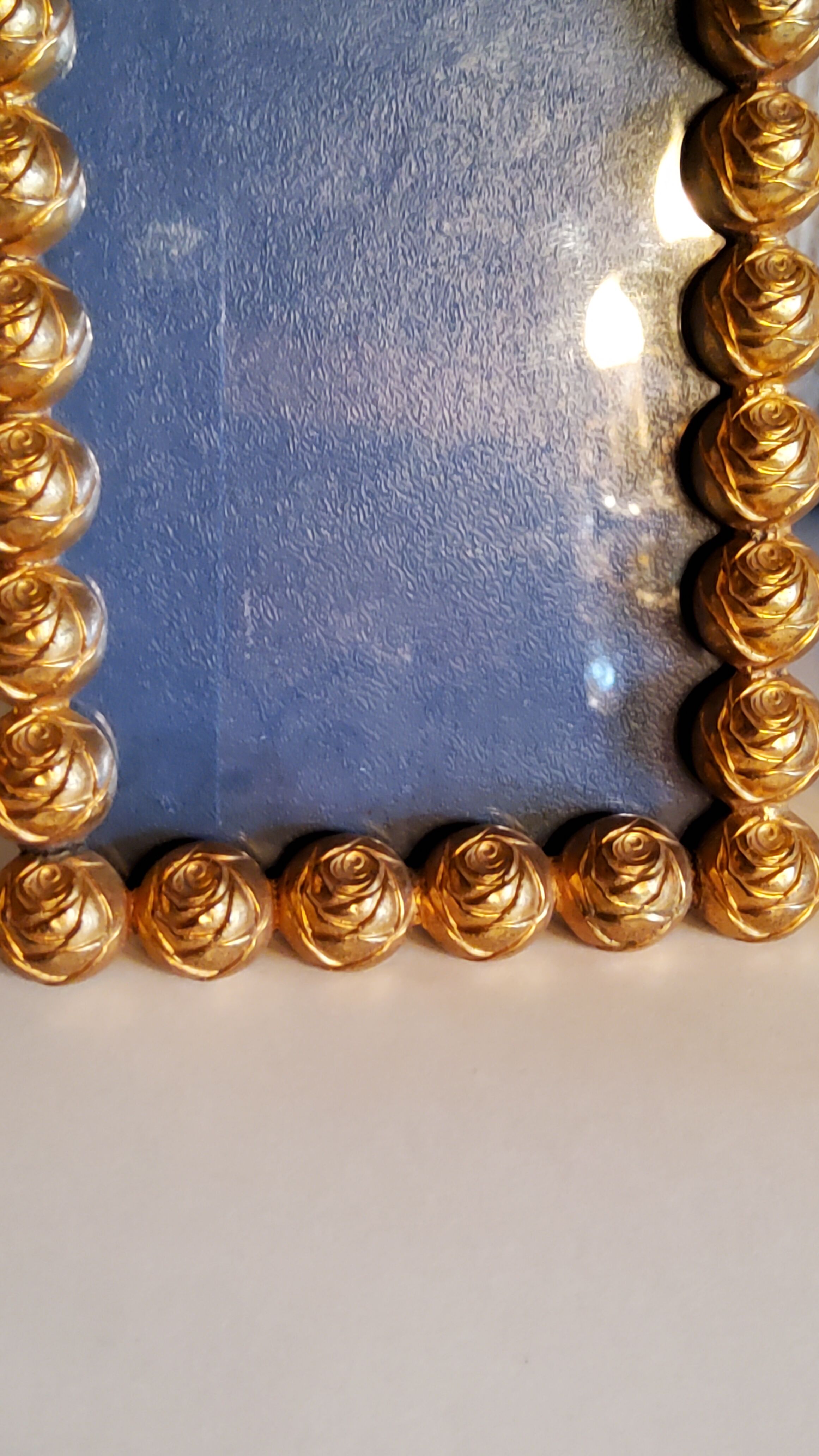 Pair of art deco photo frames in gilded bronze and gilded brass