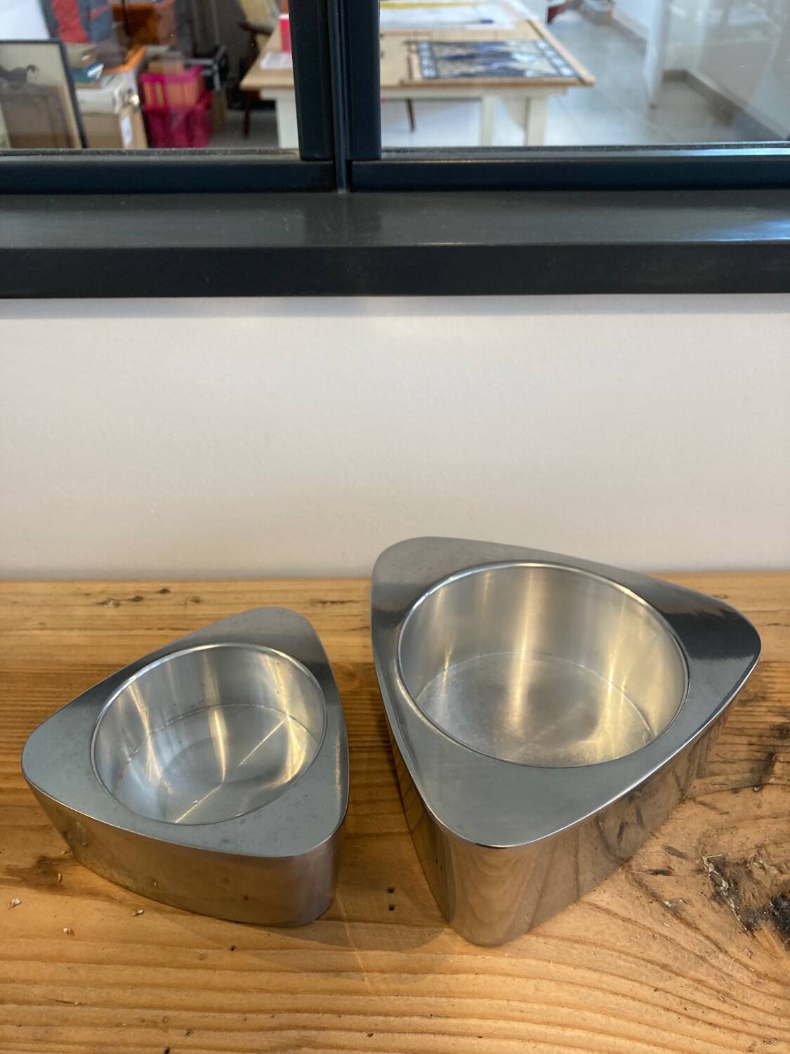 Pair of aluminum candlesticks
