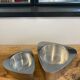 Pair of aluminum candlesticks