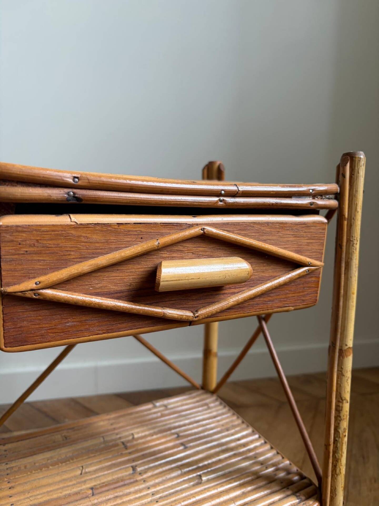 Rattan bedside tables in the style of Audoux Minet.