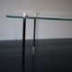 Vintage glass and black-painted brass side table