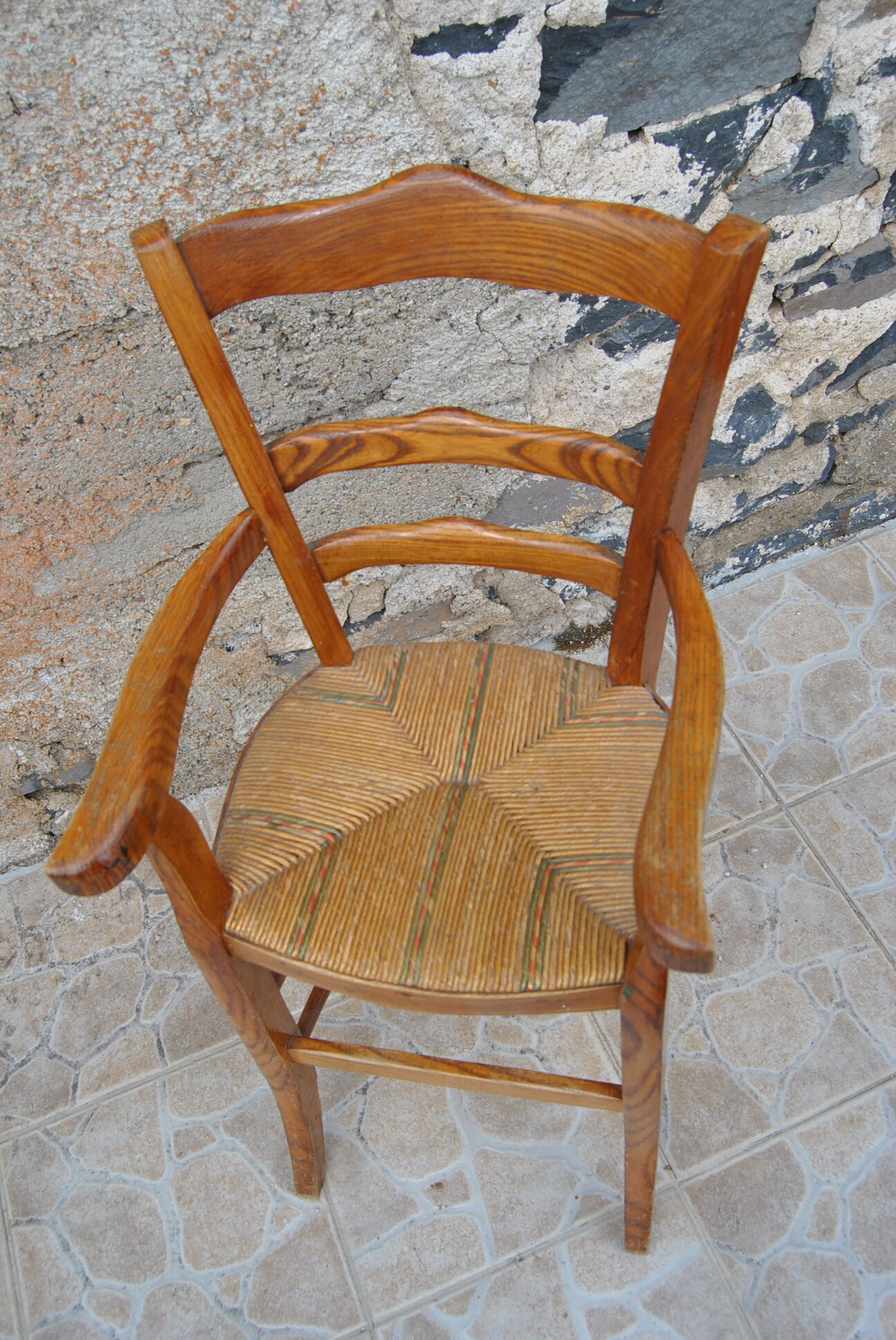 Wooden children's high chair and mulched seat