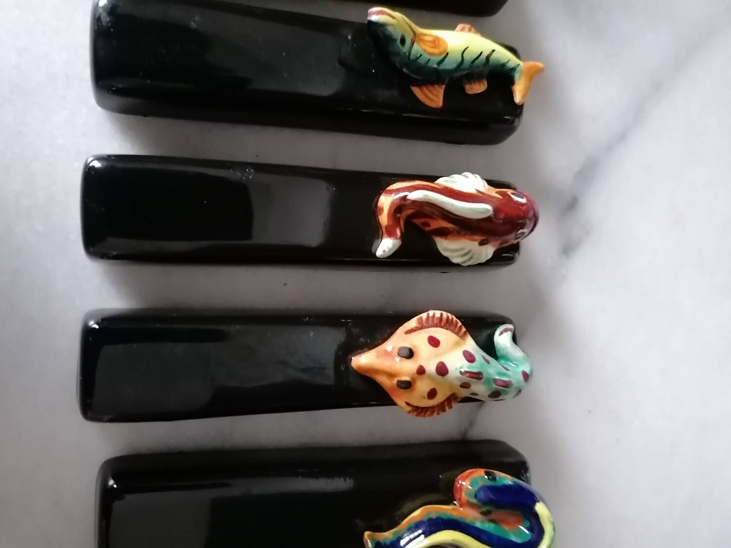 Vintage fish slip knife holders