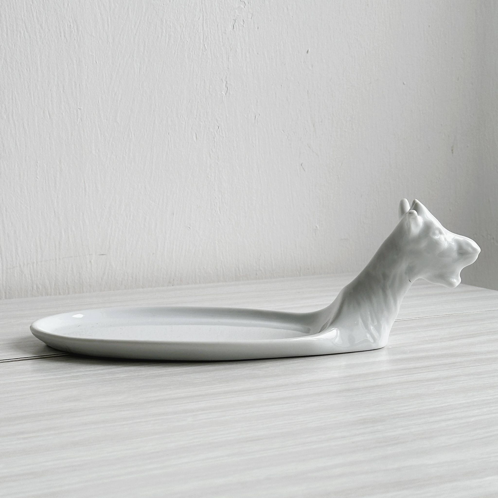 Avignon white porcelain dish in the shape of a goat.