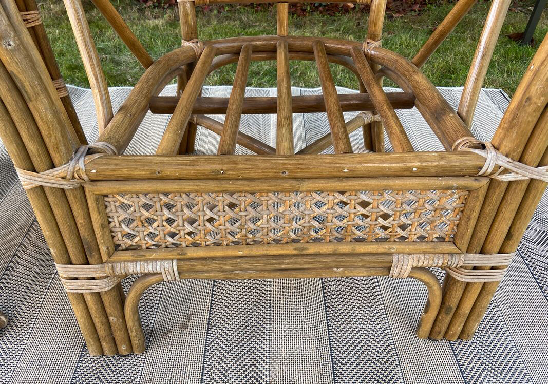 2 vintage armchairs in cannage and bamboo