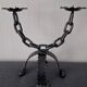 Brutalist double candle chandelier—wrought iron, chain and tripod base