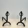 Pair of modernist wrought iron fire dogs