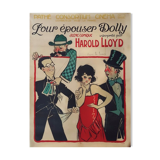 Shows old movies--"to marry Dolly"