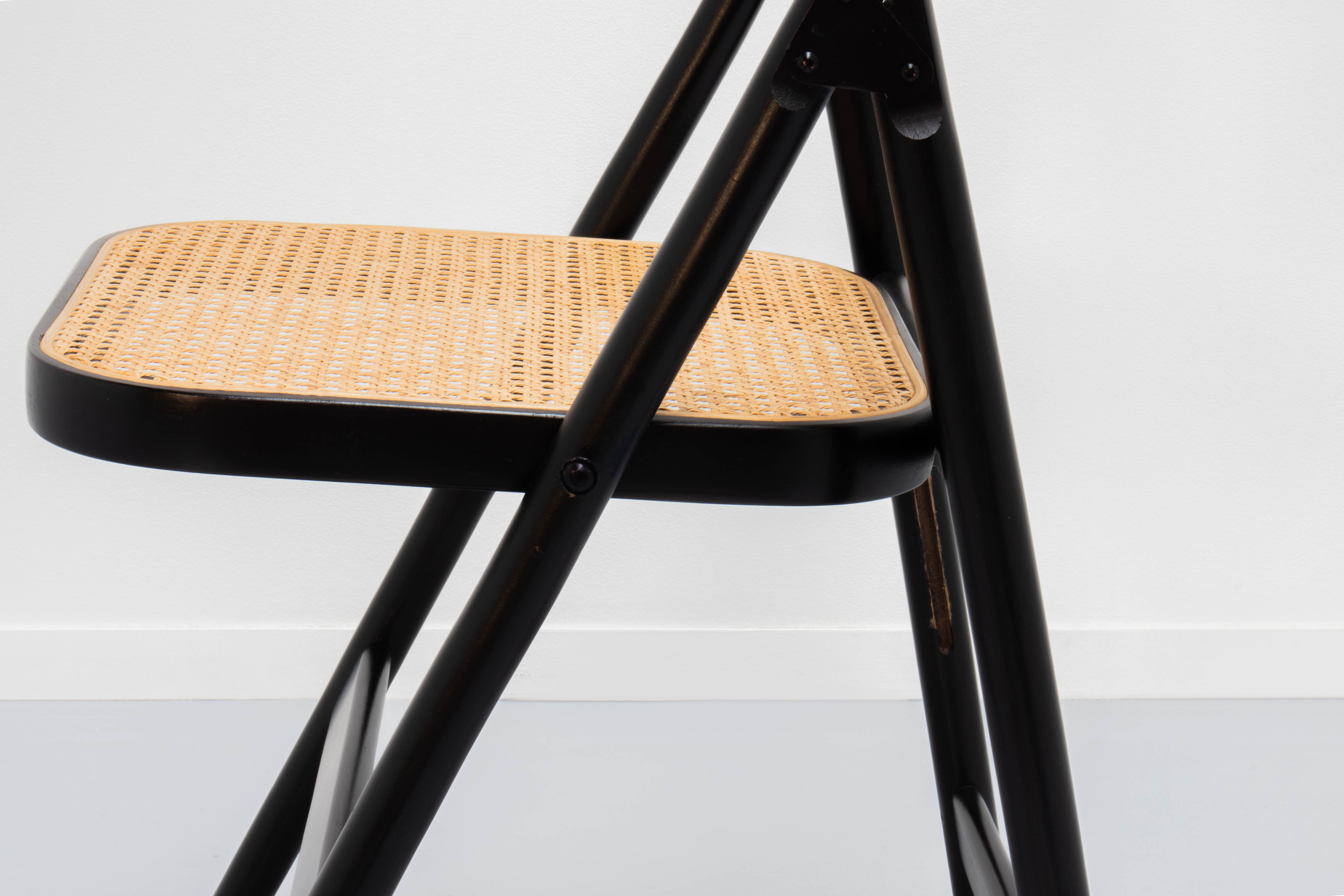 4 vintage wood folding chairs with cane seating