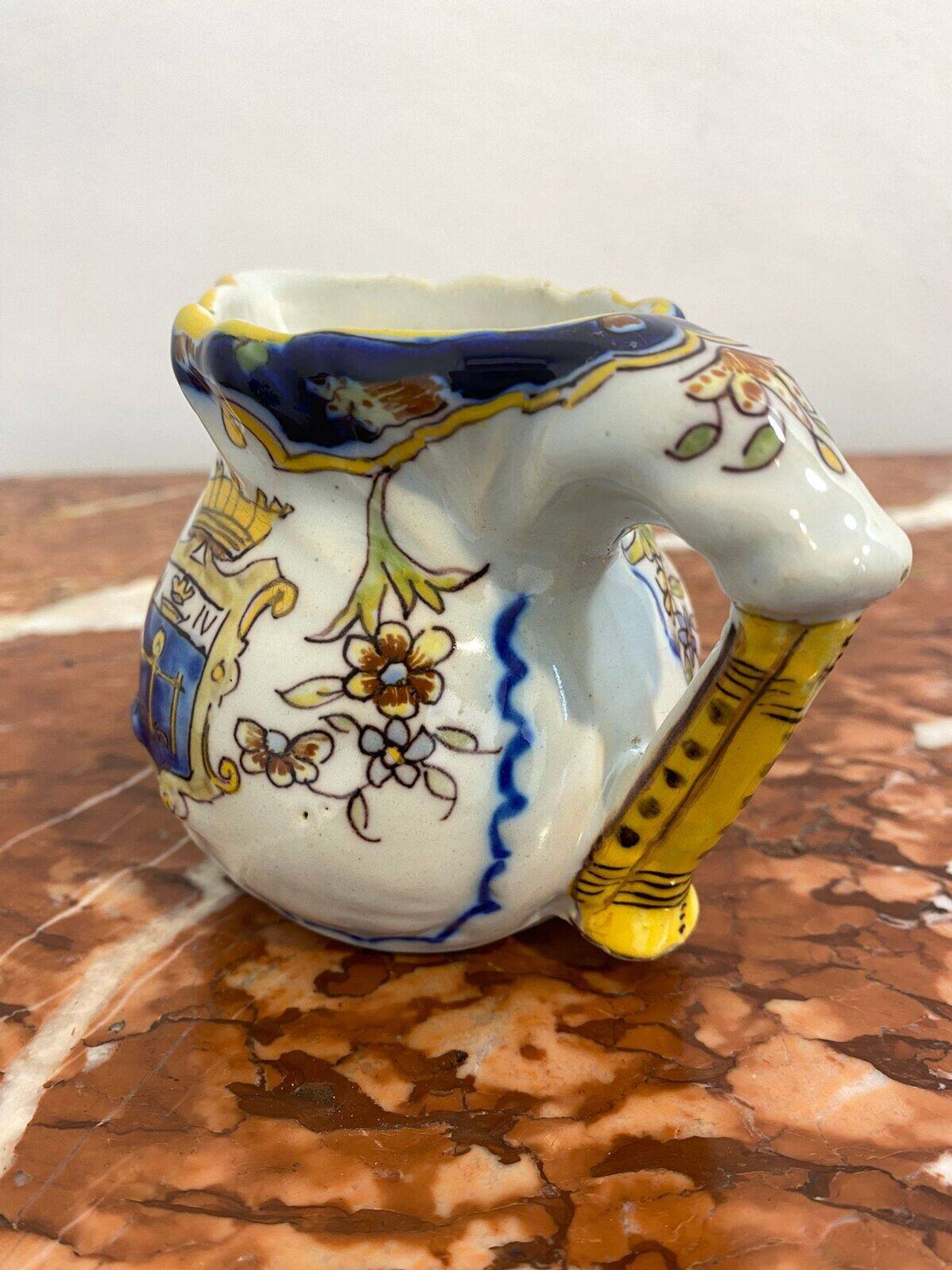 Small antique jug in faience from Les Sables d'Olonne, hand-painted.