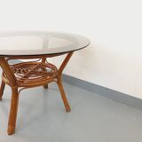 Vintage round smoked glass and rattan coffee table from the 70s