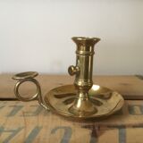 Thumb brass candlestick