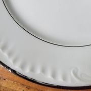 Silver-edged dessert service and its dish