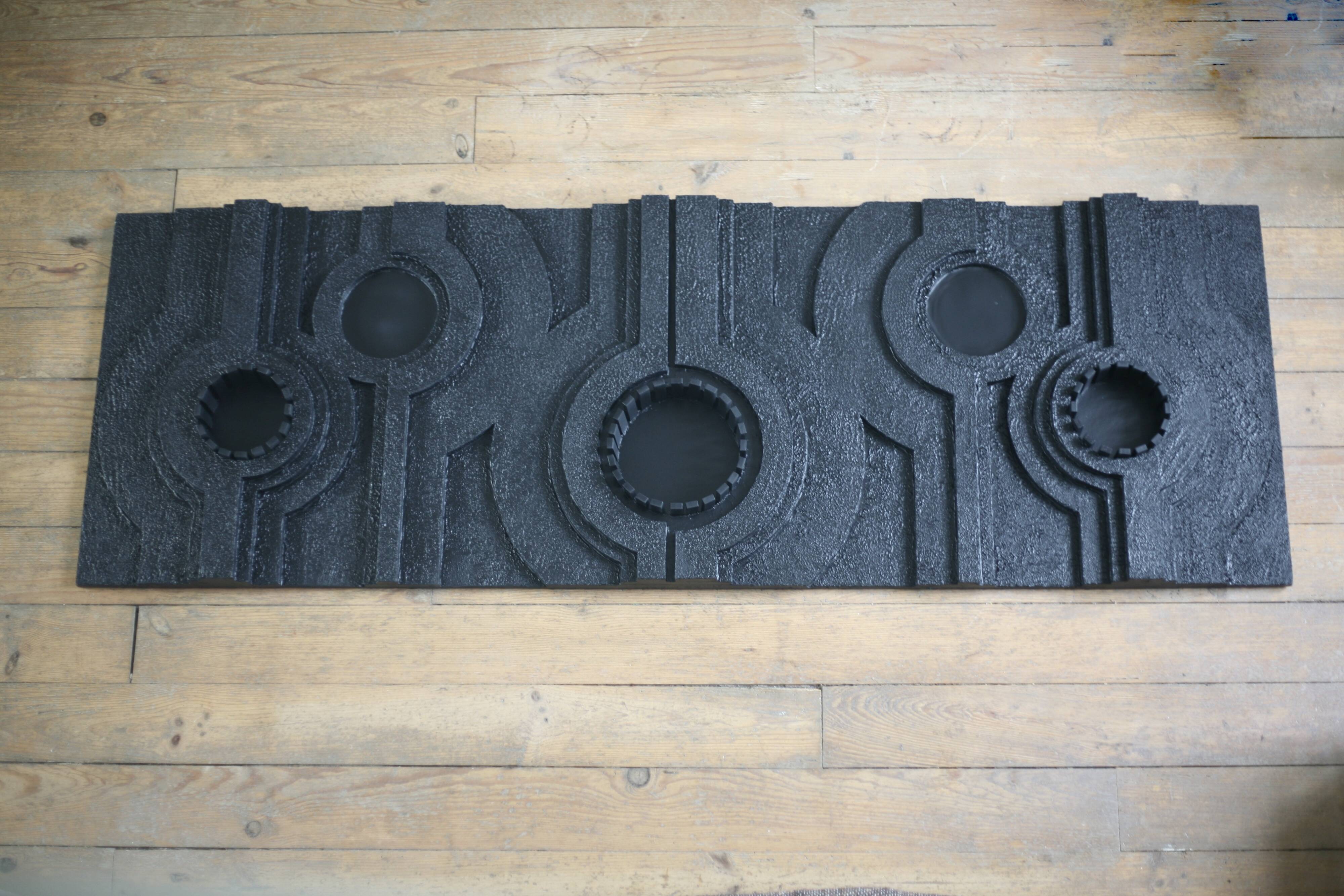 Wall sculpture, wood and black coating, late 1970s