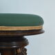 Antique piano stool with adjustable screws and turned wooden legs