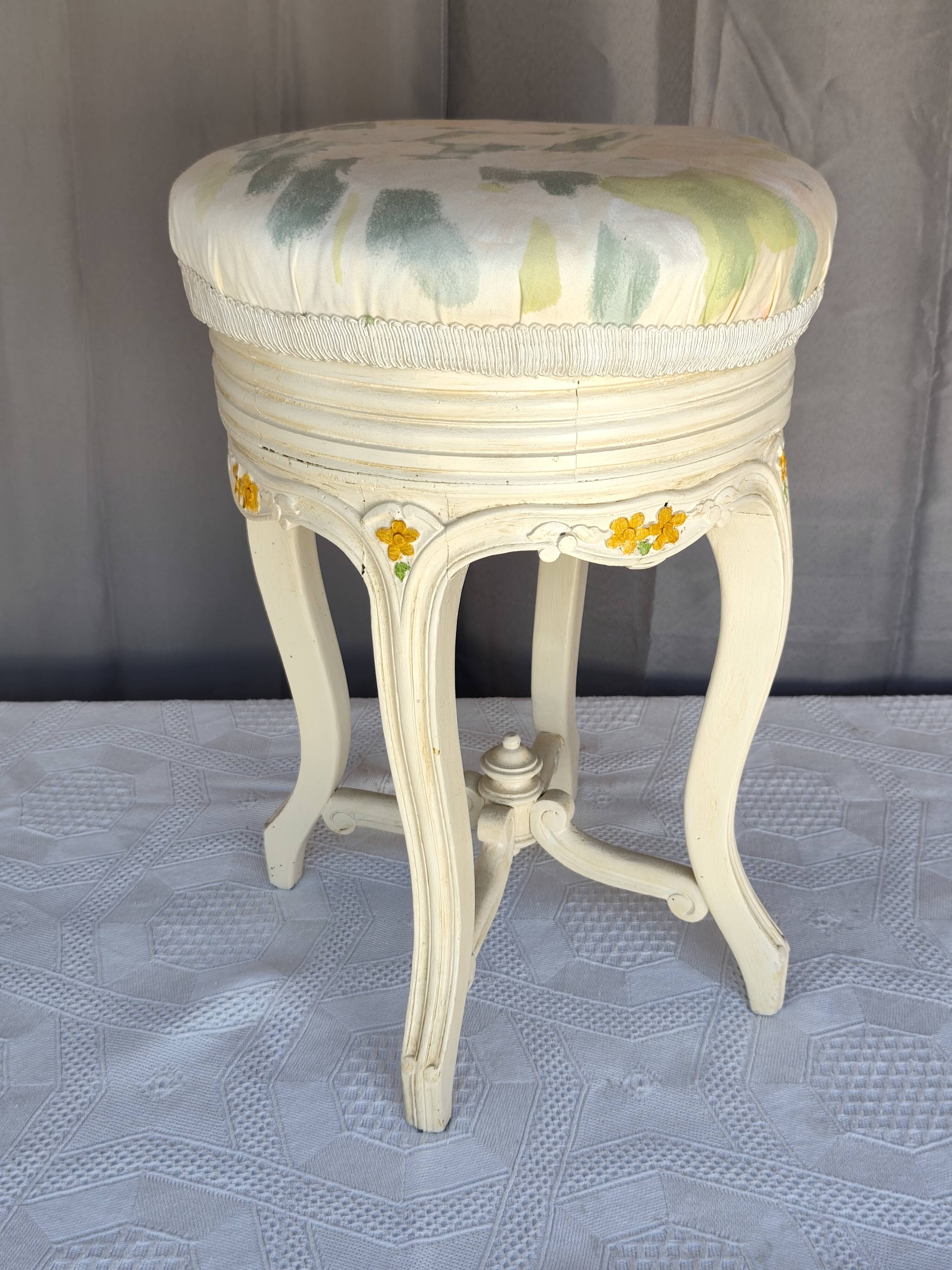 Antique upholstered stool "with screws"