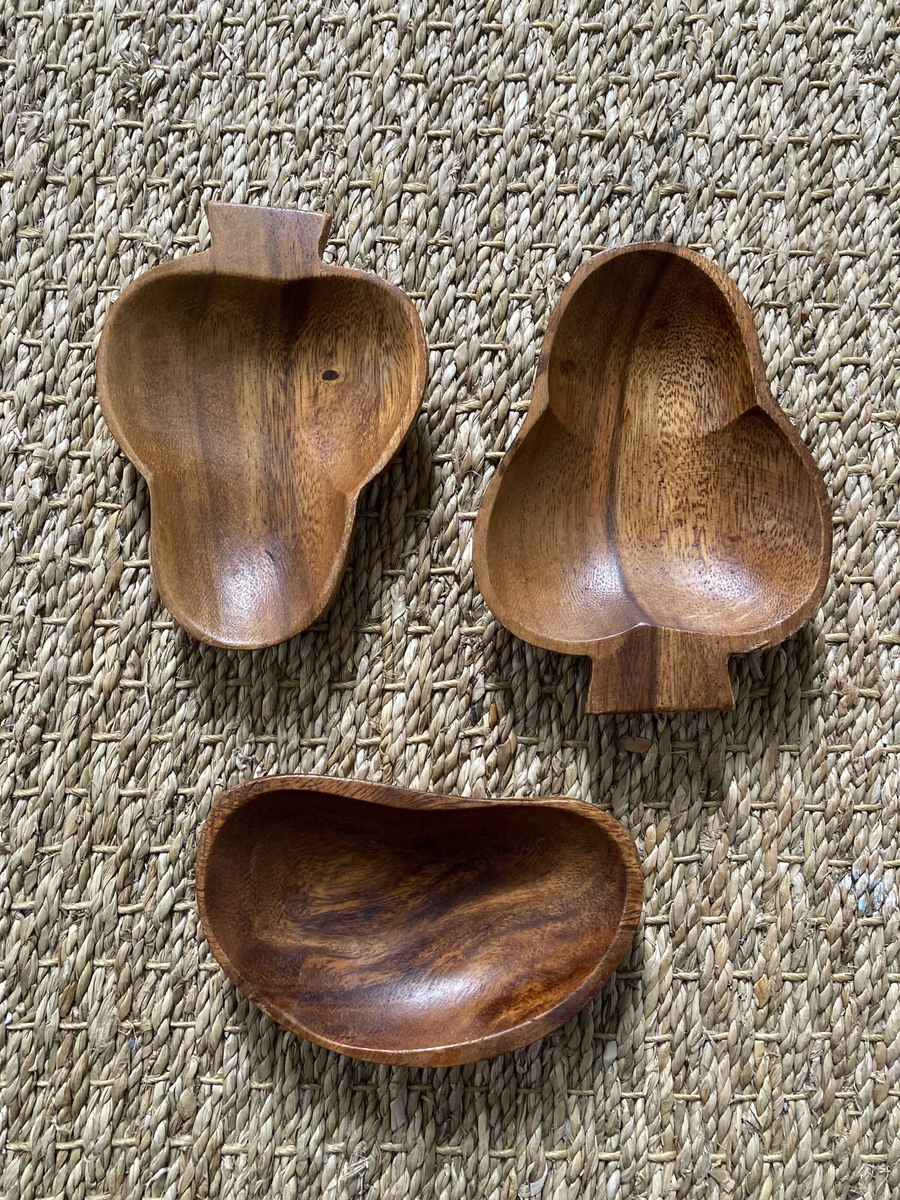 Trio of exotic wooden cups in the shape of beans and vintage clovers