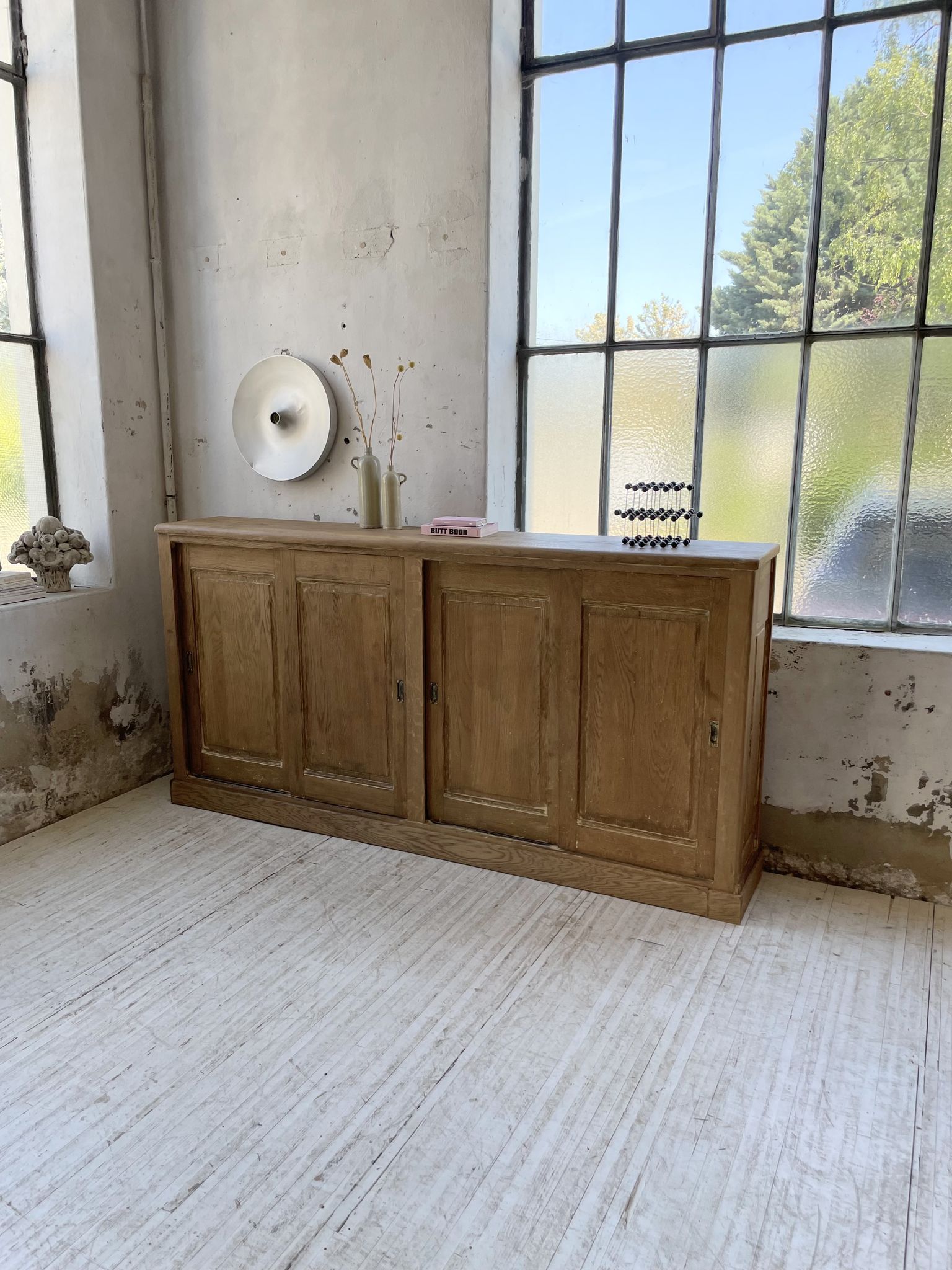 Large row of solid oak loom sliding doors