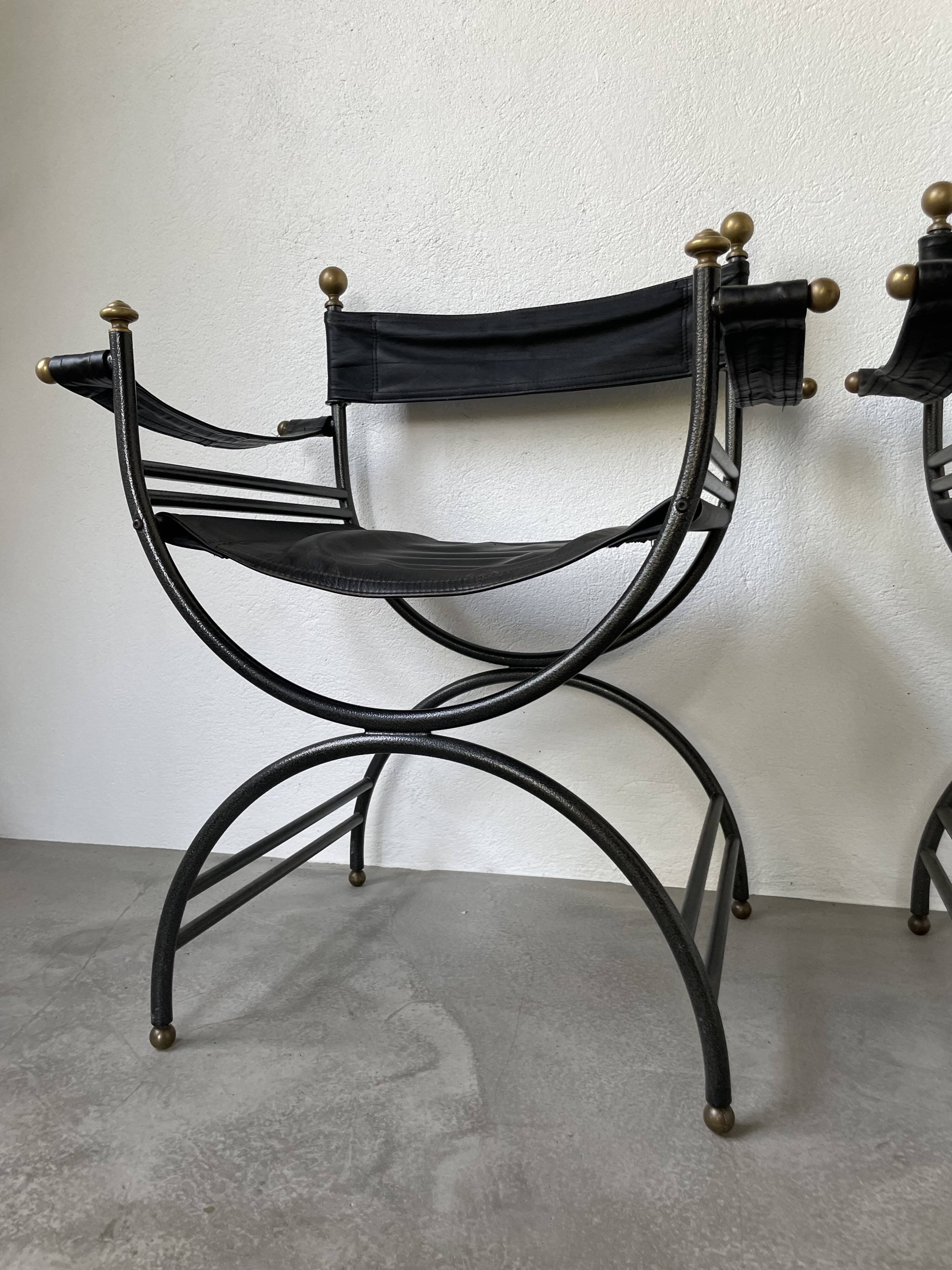 Pair of leather “curule” emperor armchairs