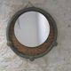Round decorative mirror in sage green and rattan – Chic country style