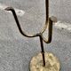 Henri POUENAT (1934-1987) Steel table or pedestal table with a golden patina