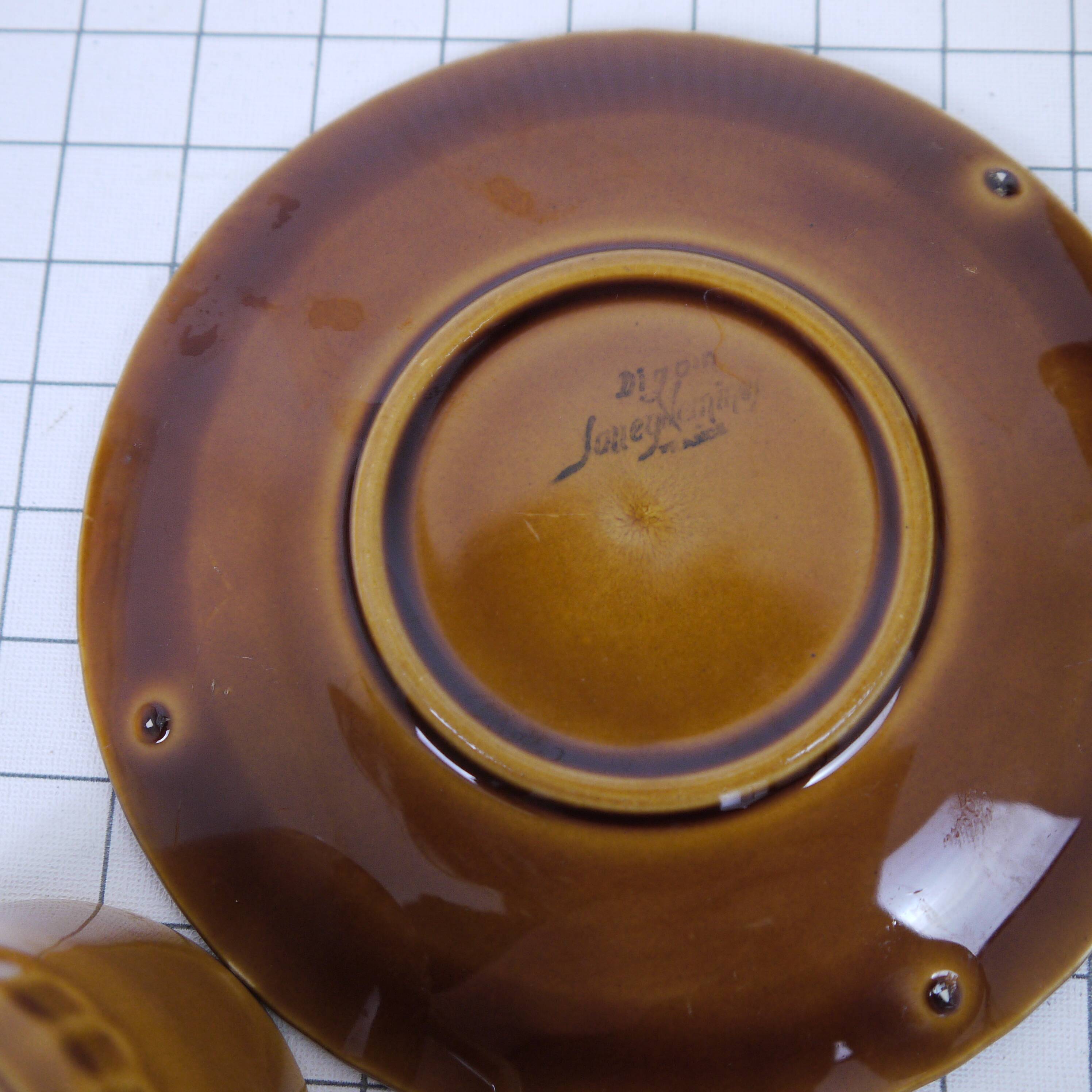 Two Digoin cups and saucers