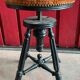 Tabouret de piano napoléon en bois noirci et assise en velours orangé en excellent état